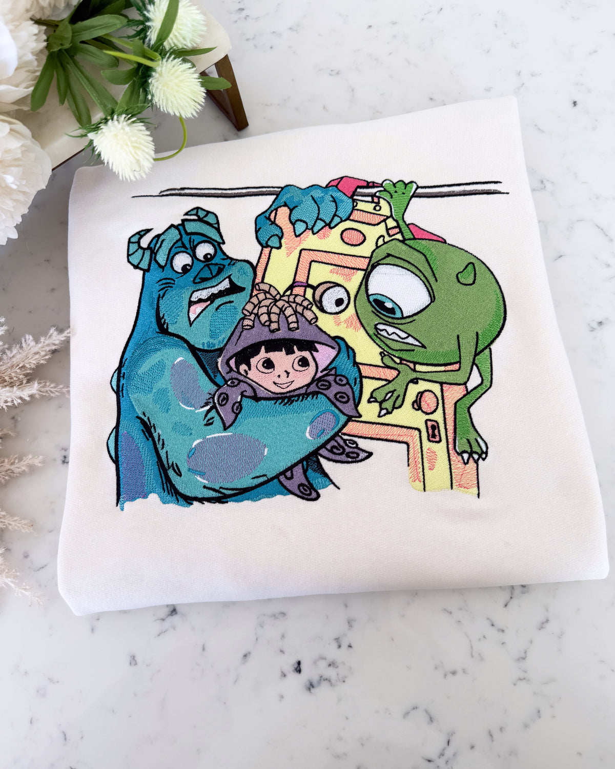 Monsters Inc Doors Adult Embroidered Sweatshirt and T-Shirt
