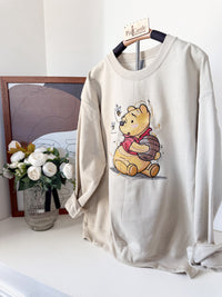 Pooh’s Honey Pot Adult Embroidered Sweatshirt and T-Shirt