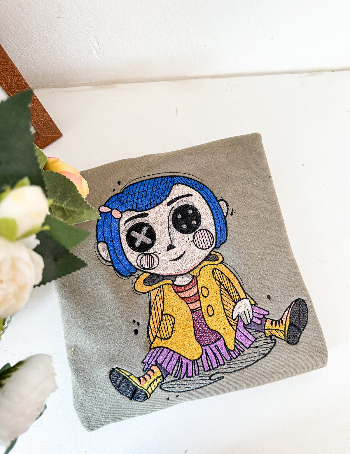 Coraline Embroidered Adult Sweatshirt and T-Shirt
